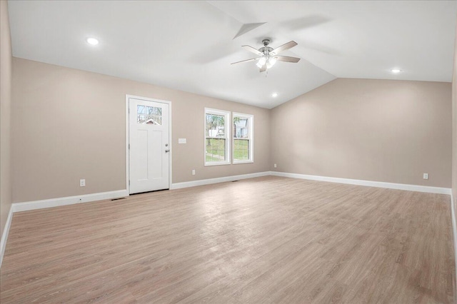 empty room with french doors, dark hardwood / wood-style floors, and lofted ceiling