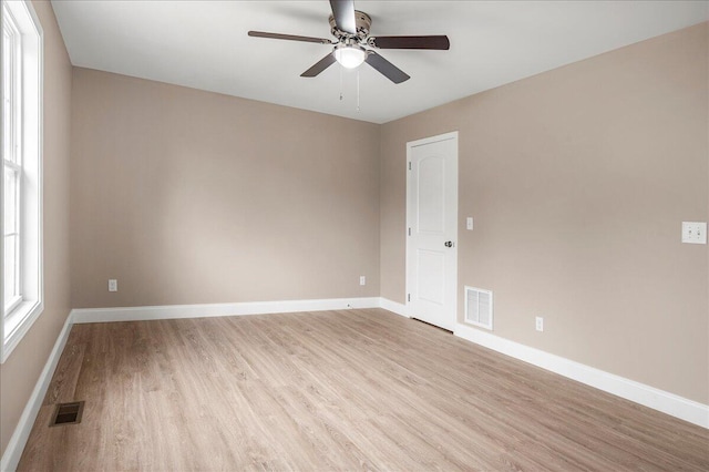 unfurnished room with ceiling fan and light hardwood / wood-style flooring