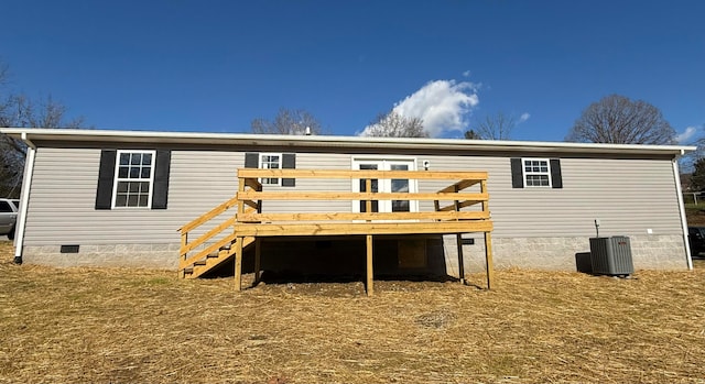 back of property featuring cooling unit and a deck