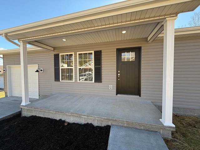 property entrance featuring a garage