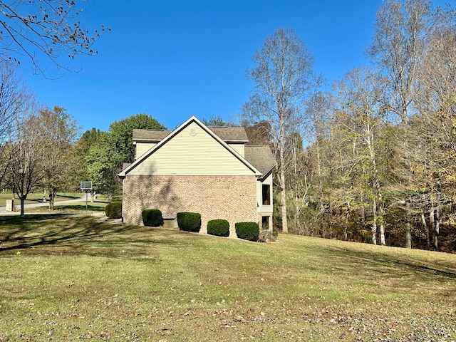 view of property exterior featuring a yard