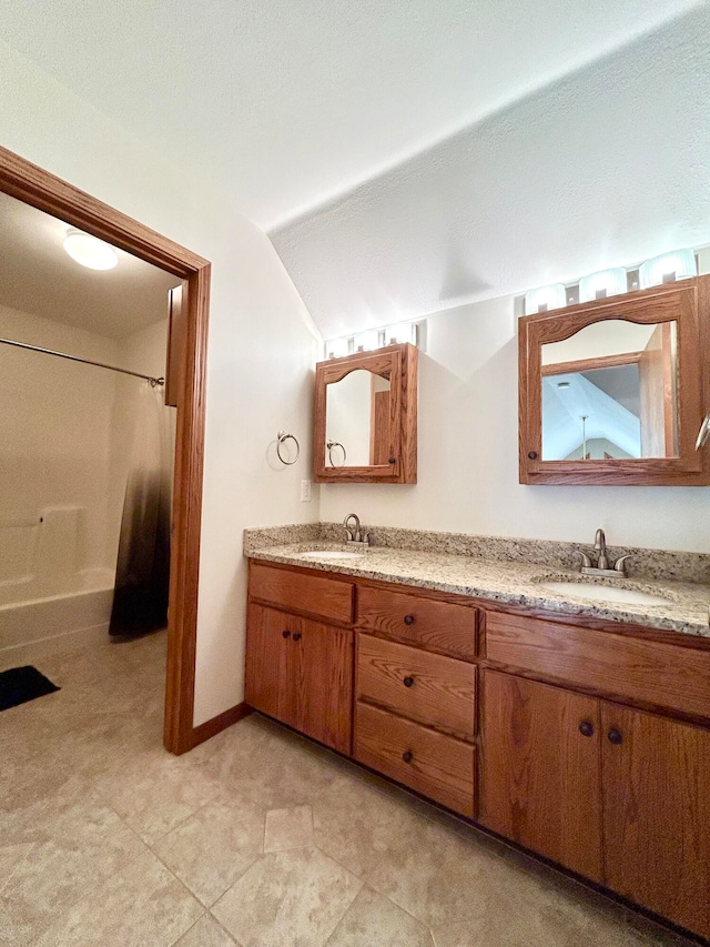 bathroom with vanity and walk in shower