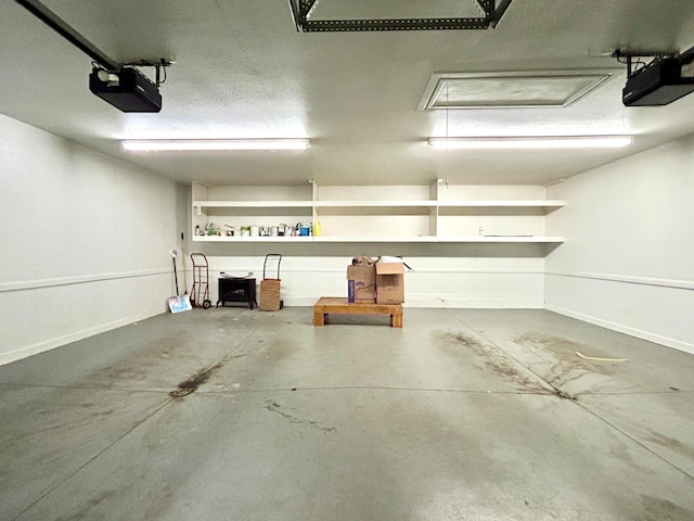 garage featuring a garage door opener