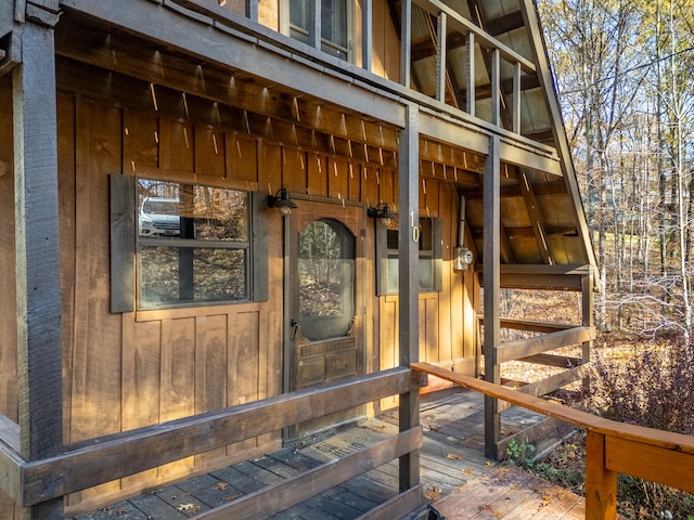 property entrance with a wooden deck