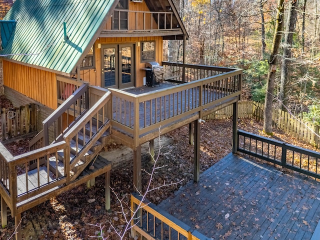 wooden deck featuring grilling area