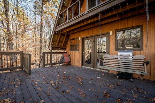 wooden terrace featuring area for grilling