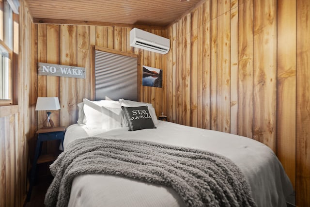 bedroom featuring a wall mounted AC, wooden walls, and wooden ceiling