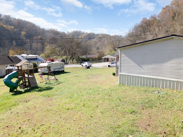 view of yard with a playground