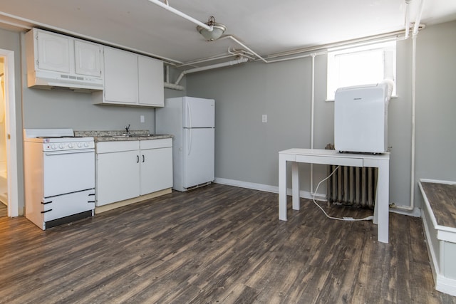 kitchen with sink, white cabinets, dark wood-type flooring, and white appliances