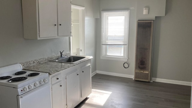 kitchen with white cabinets, sink, dark wood-type flooring, and electric stove