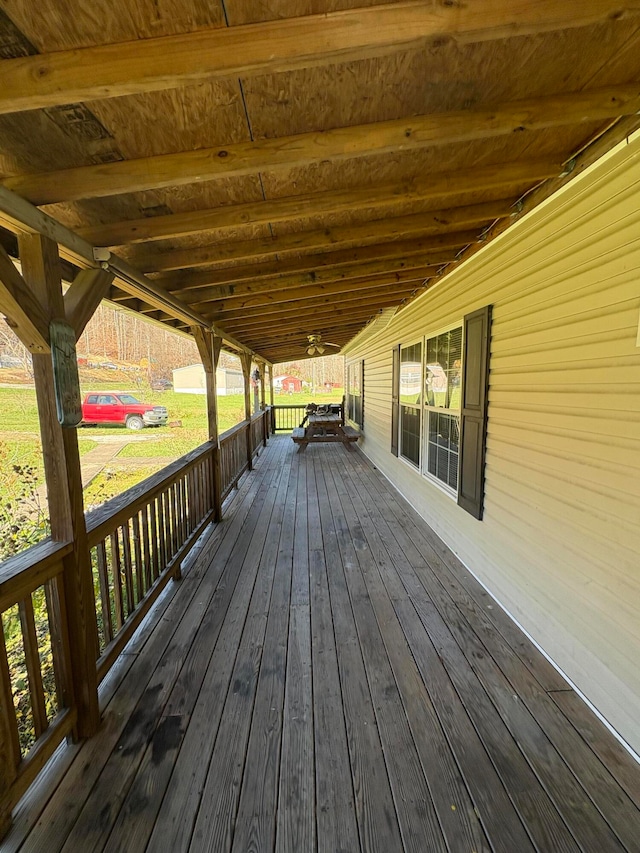 wooden terrace featuring covered porch