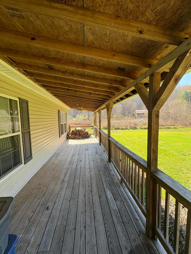 deck featuring a lawn