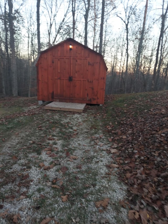 view of outdoor structure at dusk