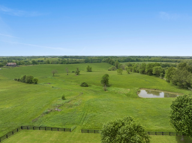 drone / aerial view with a water view and a rural view