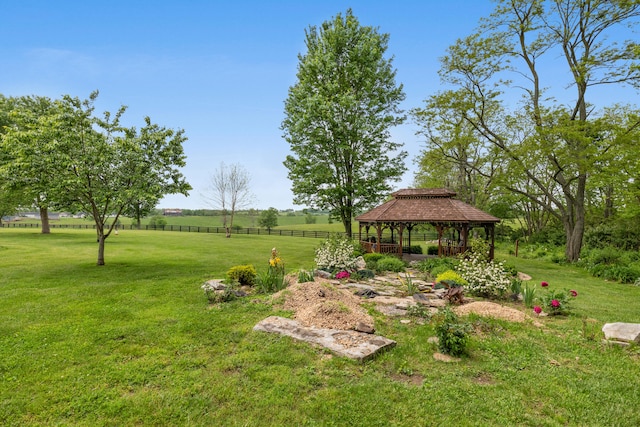 view of yard with a rural view and a gazebo