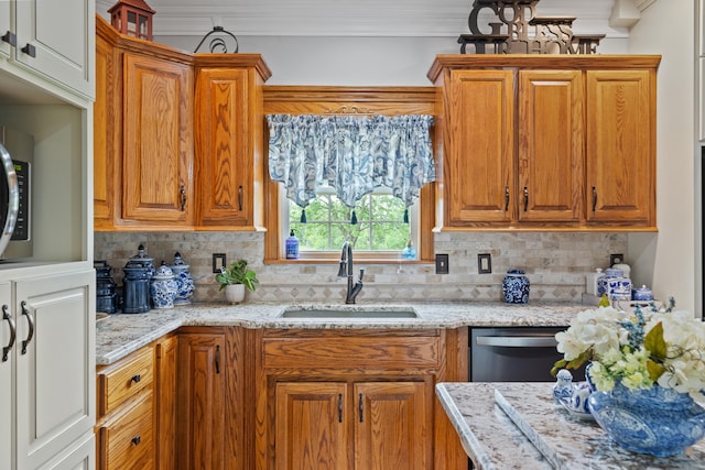 kitchen with sink, tasteful backsplash, stainless steel dishwasher, crown molding, and light stone countertops