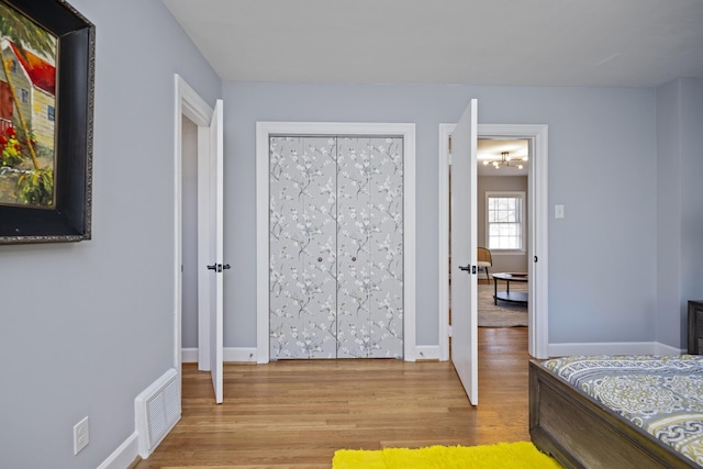 bedroom featuring light hardwood / wood-style flooring