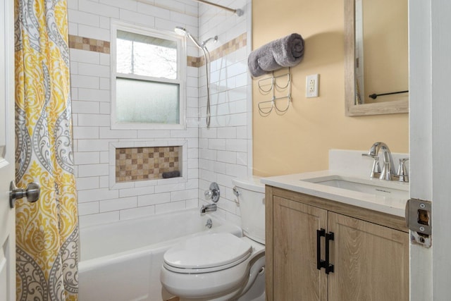 full bathroom with shower / tub combo, vanity, and toilet