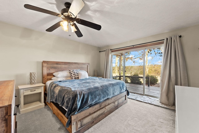 bedroom with access to outside, ceiling fan, light carpet, and a textured ceiling