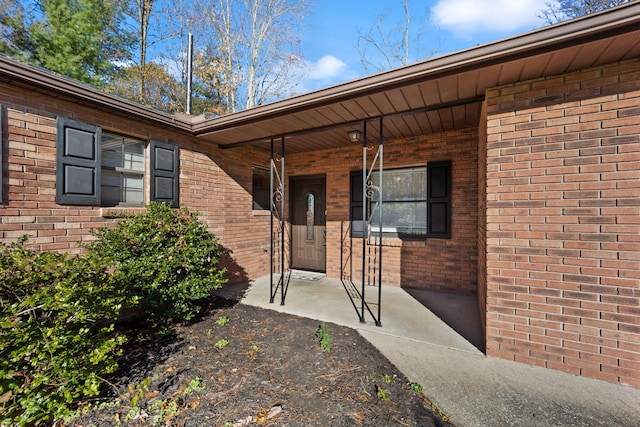 entrance to property with covered porch