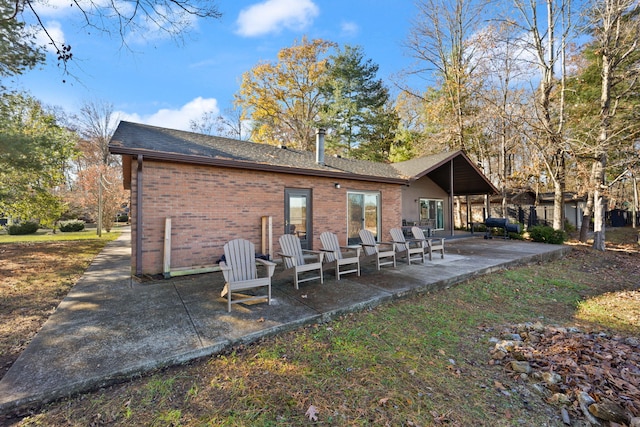 rear view of house with a patio area