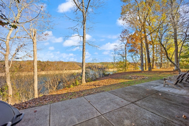 view of patio / terrace featuring a water view