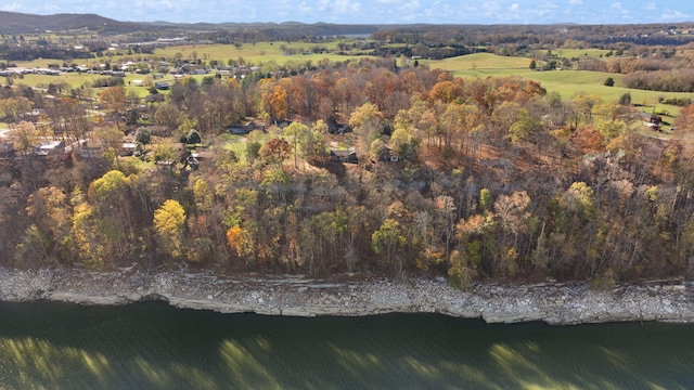 birds eye view of property featuring a water and mountain view