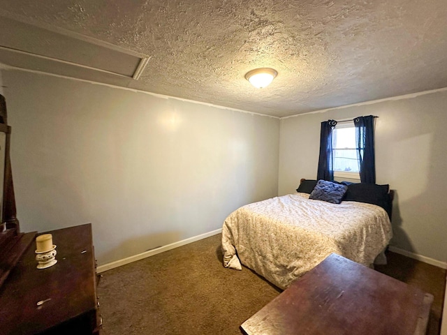 carpeted bedroom featuring a textured ceiling