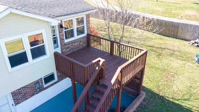 deck featuring a yard