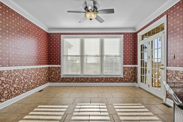 unfurnished sunroom with ceiling fan