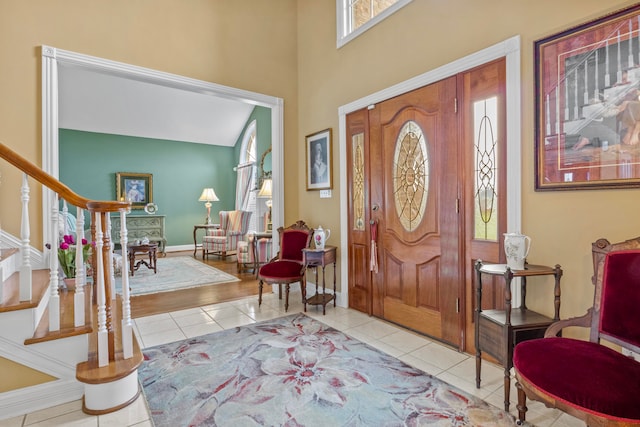 foyer with light tile patterned flooring