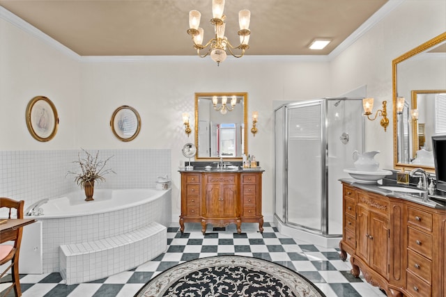 bathroom featuring an inviting chandelier, vanity, crown molding, and independent shower and bath