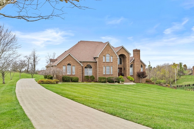 view of front of home with a front lawn