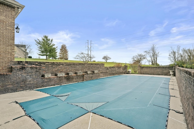view of pool featuring fence and a fenced in pool