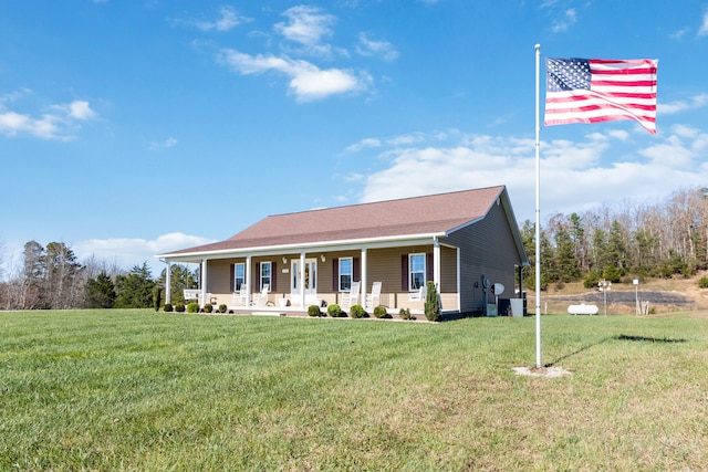 view of front of home featuring a porch and a front lawn