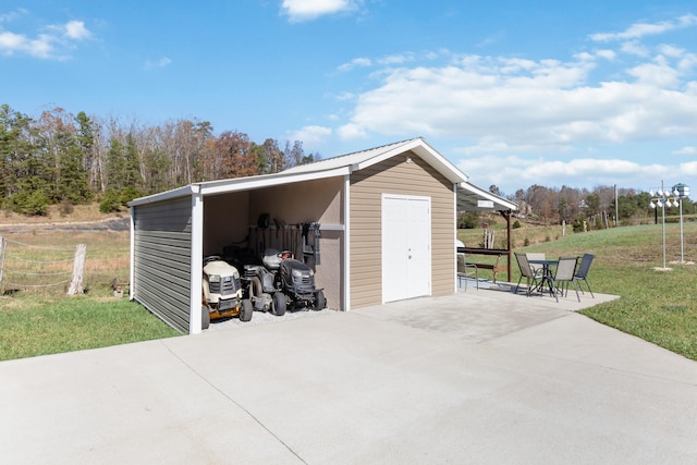 garage with a yard