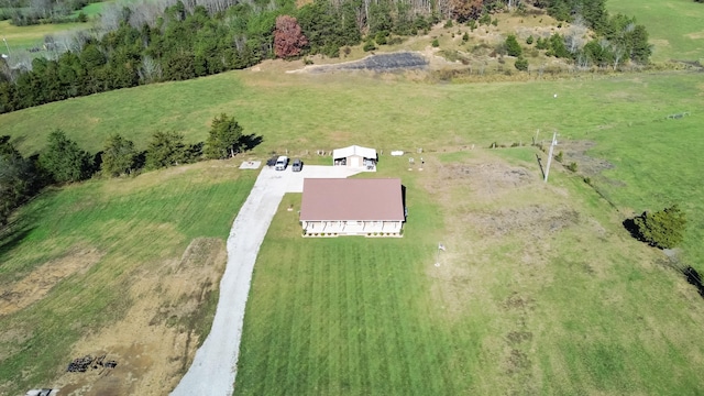 birds eye view of property featuring a rural view