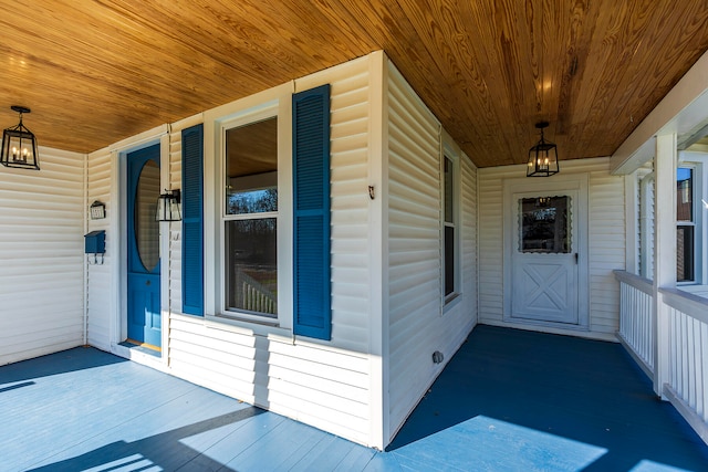 doorway to property with a porch