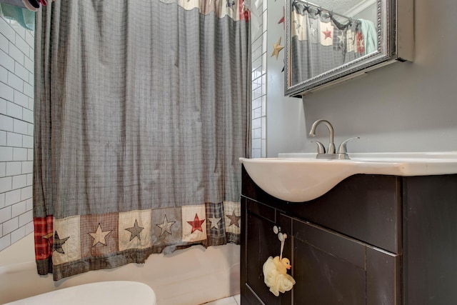 full bathroom with vanity, shower / bathtub combination with curtain, and toilet