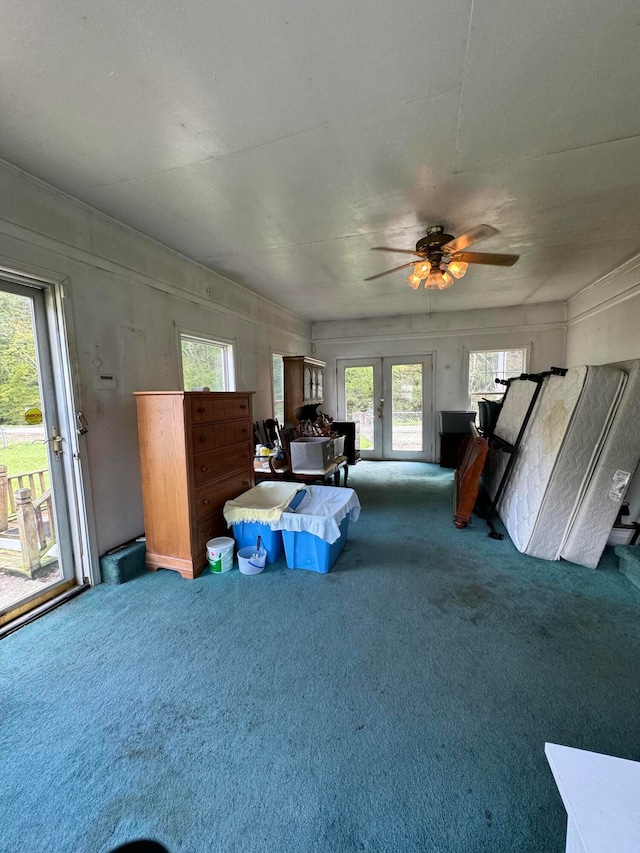 interior space featuring ceiling fan and french doors