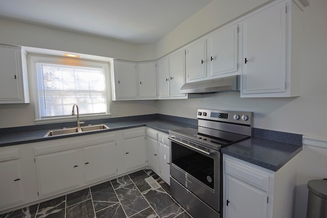 kitchen with white cabinetry, stainless steel electric range oven, and sink