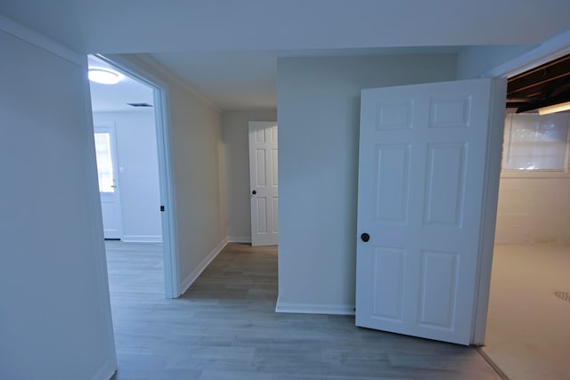 corridor featuring light wood-type flooring