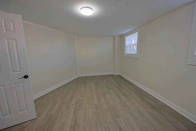 empty room with light hardwood / wood-style floors