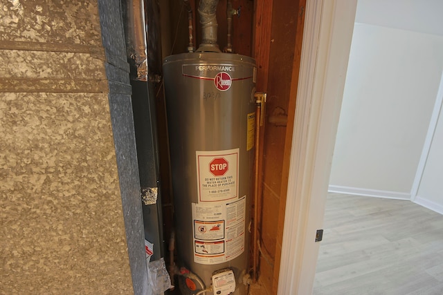 utility room with water heater