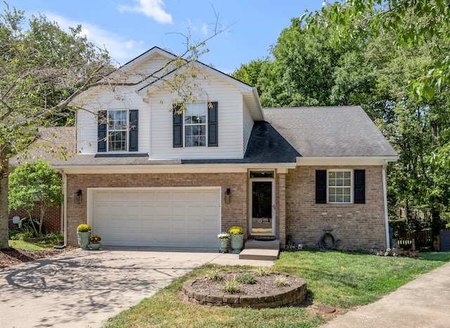 front facade featuring a garage and a front yard