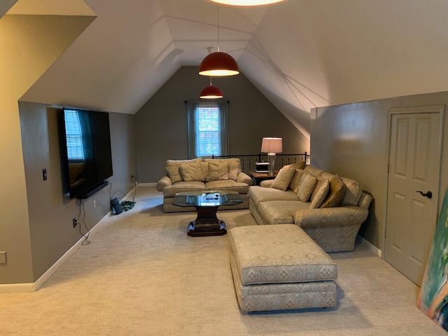 living room featuring carpet floors and lofted ceiling