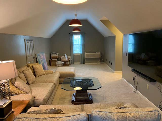 carpeted living room with a wall unit AC and lofted ceiling