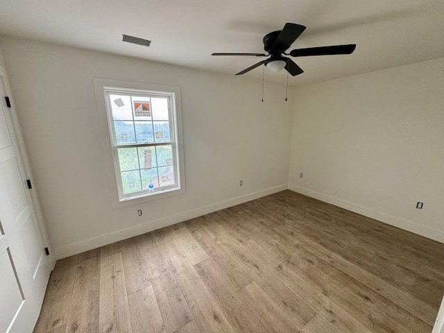 6033 Arbor Woods Way, Richmond, KY 40475 - spare room with light wood finished floors, baseboards, and ceiling fan