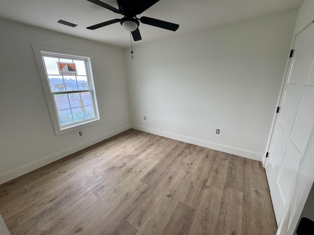 6033 Arbor Woods Way, Richmond, KY 40475 - unfurnished bedroom with wood finished floors, baseboards, and a ceiling fan