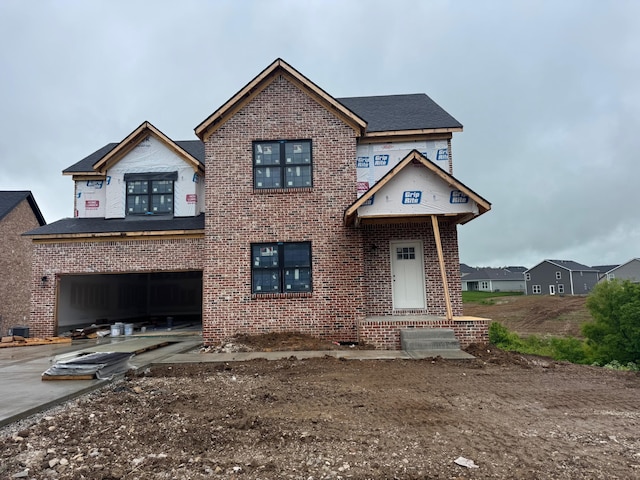 6033 Arbor Woods Way, Richmond, KY 40475 - unfinished property featuring driveway, brick siding, and an attached garage